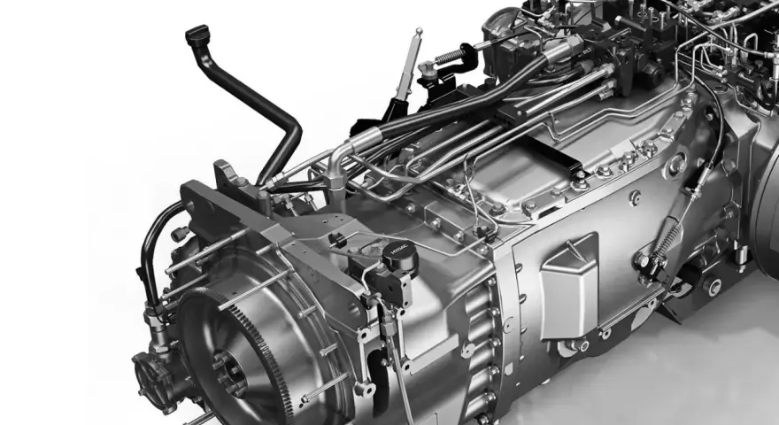 Skrzynia hydrostatyczna zasada działania: złożony mechanizm z licznymi przewodami hydraulicznymi i elementami sterującymi, pokazujący przepływ mocy.