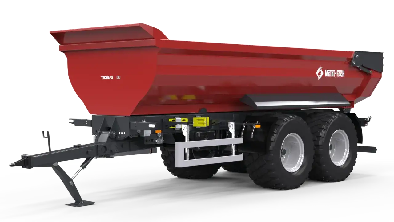 Czerwona wywrotka tandem z podw&oacute;jnymi kołami, gotowa do transportu materiał&oacute;w.